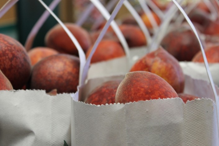Bags of fresh picked peaches
